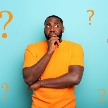 restoro system optimizer man in yellow shirt wondering yellow question marks around him blue background